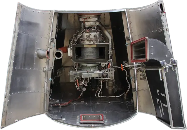 A320 family APU compartment seen from below, with both access doors open, showing the APU, the inlet plenum and the air intake duct